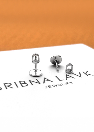 Сережки без вставок Срібло 925° золото 375° 616с